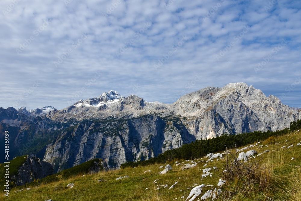 View of mountains Triglav and Rjavina in Julian alps and Triglav national park, Gorenjska, Slovenia with the peak covered snow