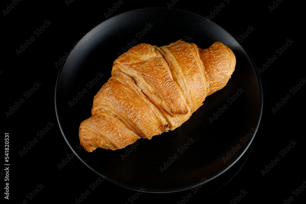 Ταπετσαρία Croissant on a black plate. Top view