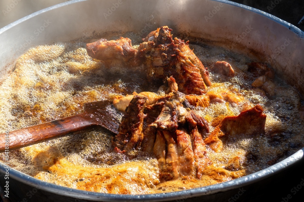 Saucepan with pork carnitas frying in lard in Mexico Stock Photo Adobe Stock