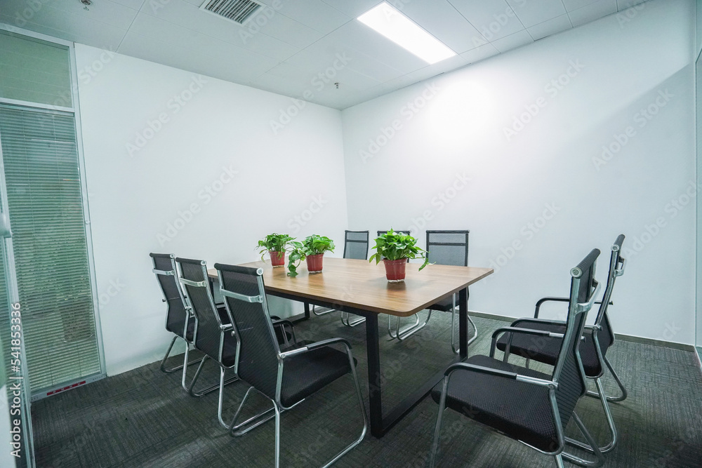 a small empty meeting room interior a small empty meeting room interior
