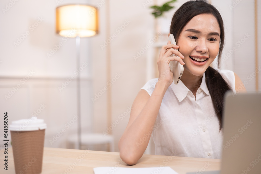 Portrait business woman smile and use tablet checking information .Asian people having online business meeting, video conferencing . Portrait business woman smile and use tablet checking information .Asian people having online business meeting, video conferencing .