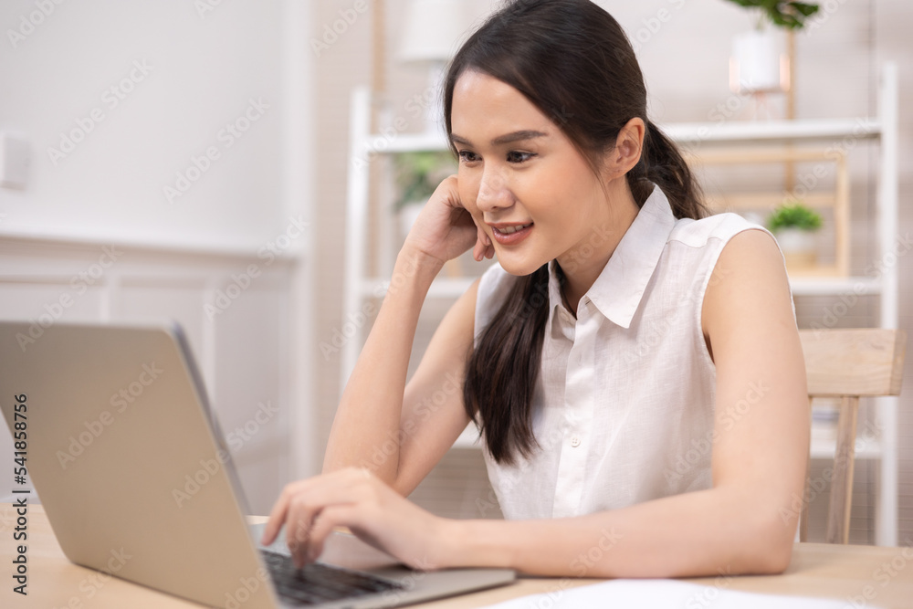Portrait business woman smile and use tablet checking information .Asian people having online business meeting, video conferencing . Portrait business woman smile and use tablet checking information .Asian people having online business meeting, video conferencing .