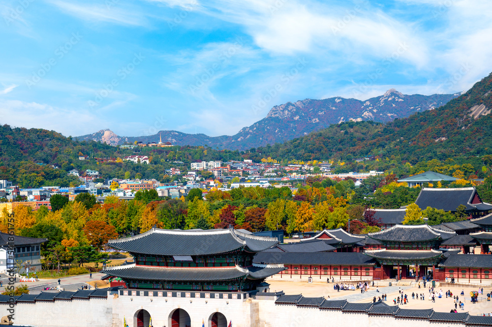 Autumn of Korean tradition architectural of Gyeongbokgung palace and modern building cityscpae modern office view background, Seoul, Republic of Korea