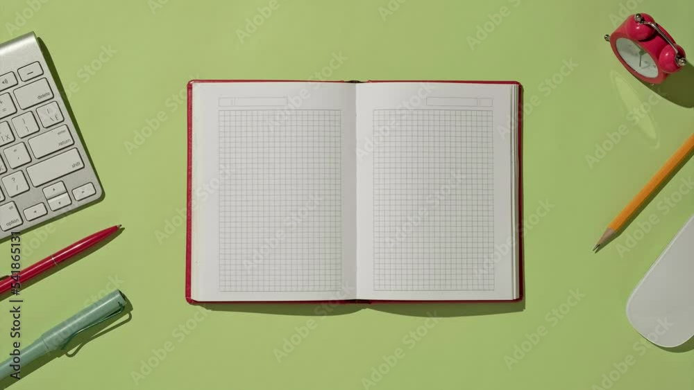 Workplace in the office or at home on the table with a notebook or diary for study or notes and turn the pages.