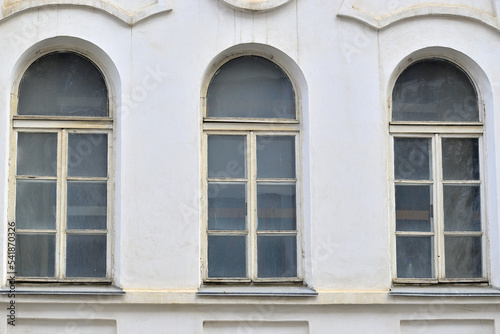 Fragment of the facade of a historic building on an autumn day