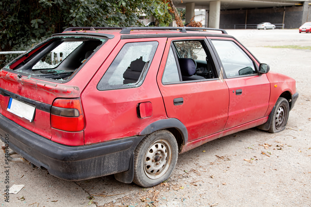 Car with broken windows. A criminal incident. Broken glass window car damaged has accident. Broken glass. Thief broken glass in car window Car with broken windows. A criminal incident. Broken glass window car damaged has accident. Broken glass. Thief broken glass in car window