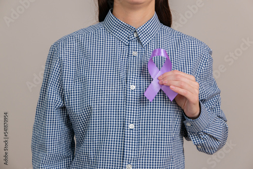 Woman holding a purple ribbon in her hands ADD,ADHD,Alzheimer Disease ,Arnold Chiari Malformation,Childhood Hemiplegia stroke, Epilepsy, Chronic Acute Pain,Crohns