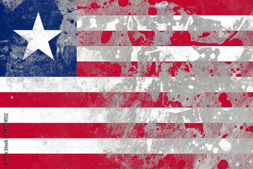 Liberia flag on scratched old grunge texture background