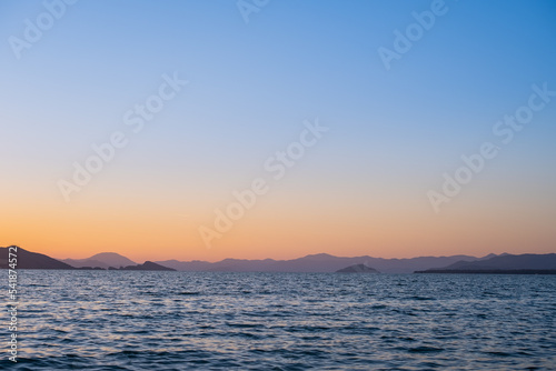 Sunset over the bay, bay in Fethiye, Turkish mediterranean coast, idea for background or advertising