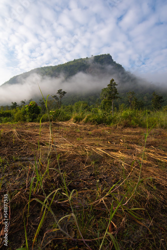 Mountains during sunrise. Beautiful natural landscape in the winter time in Saiyok, Kanchaburi, Thailand. photo