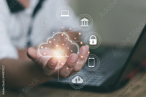 Man using computer showing cloud computing diagram in hand. cloud technology data storage network and internet service concept