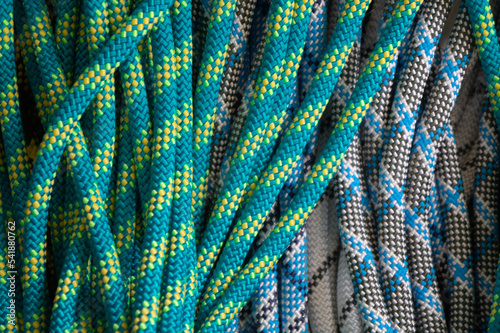 Multicoloured rope for climbing and mountaineering as a pattern, background