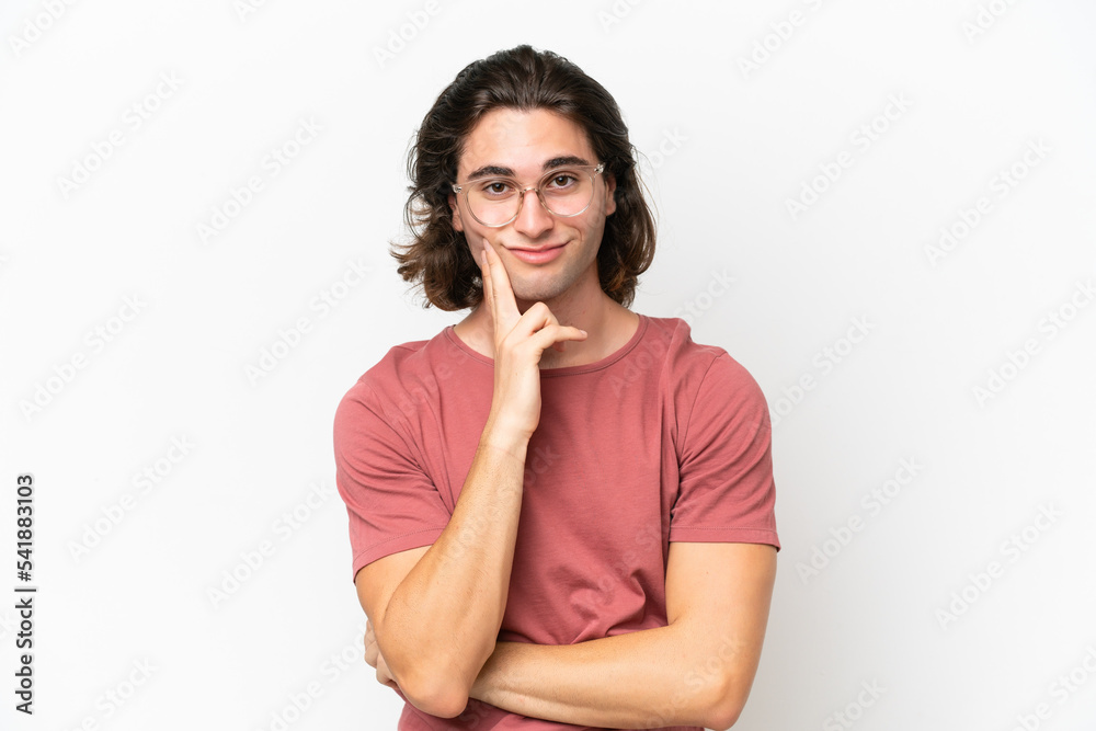 Young handsome man isolated on white background and thinking Young handsome man isolated on white background and thinking