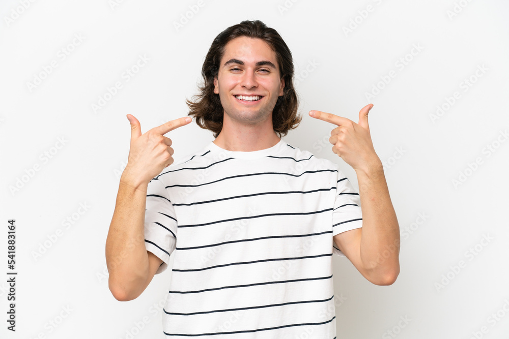 Young handsome man isolated on white background giving a thumbs up