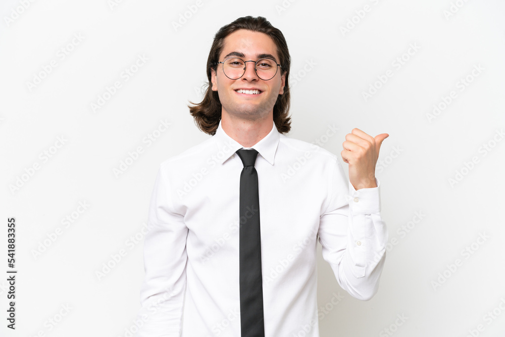 Business handsome man isolated on white background pointing to the side to present a product Business handsome man isolated on white background pointing to the side to present a product