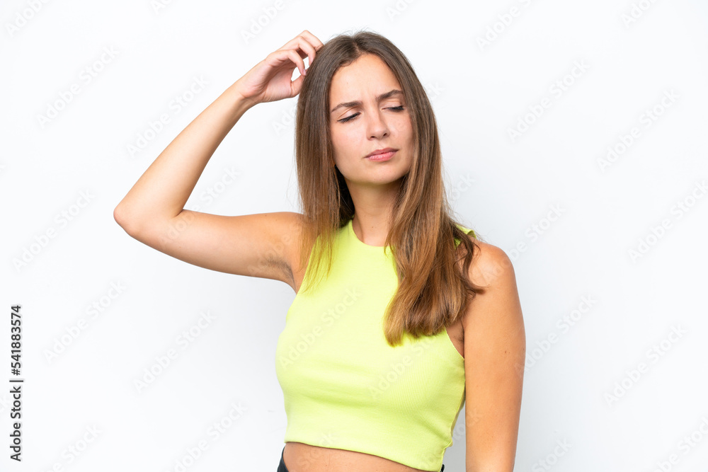 Young caucasian woman isolated on white background having doubts while scratching head Young caucasian woman isolated on white background having doubts while scratching head