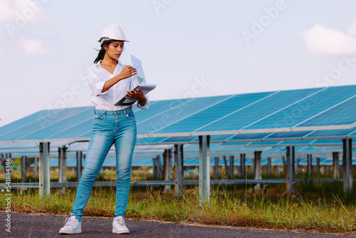 Inspector engineering concept; Engineer inspect solar panel at solar power plant .