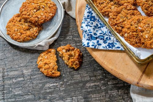 Anzac biscuits - traditional sweet Australian oatmeal and coconut cookies photo