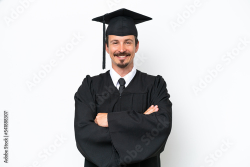 Young university graduate man isolated on white background keeping the arms crossed in frontal position