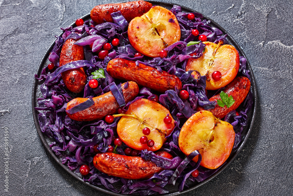 Seared Sausage, Red Cabbage and Apples on plate StockFoto Adobe Stock