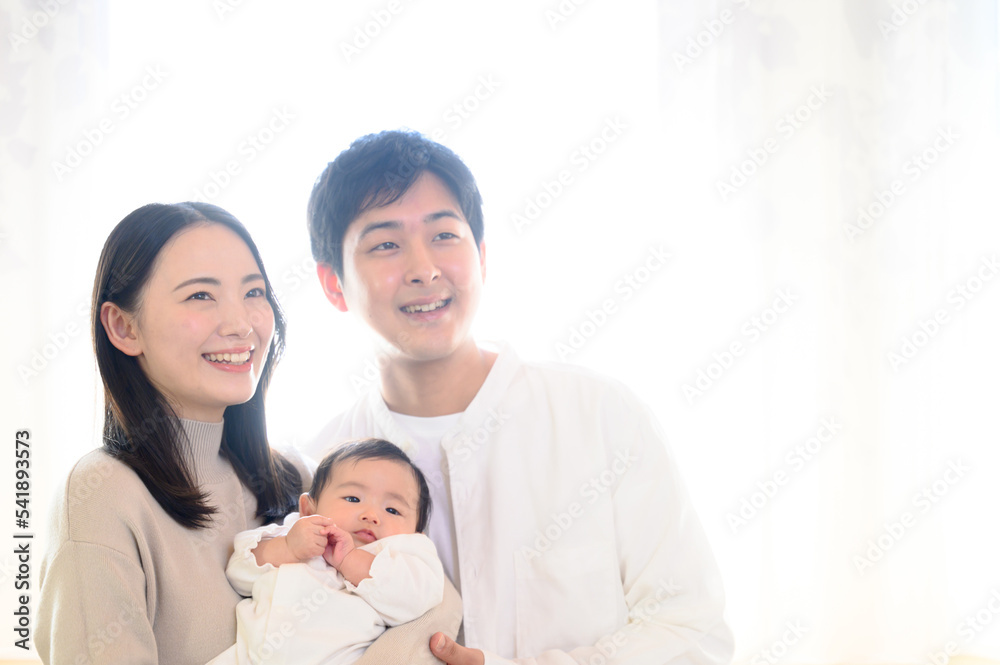 Family portrait in backlight with copy space at right