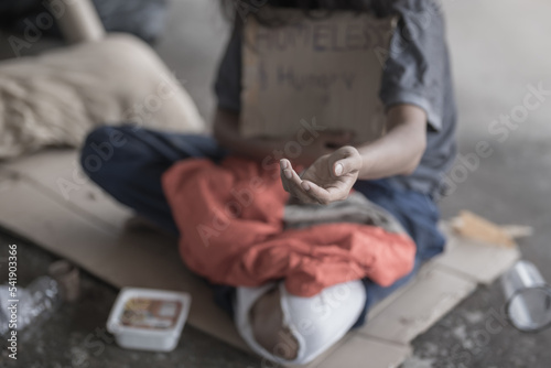 Beggar people and human poverty concept - senior person hands begging for food or help