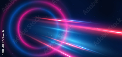 Abstract technology futuristic neon circle glowing blue and pink  light lines with speed motion blur effect on dark blue background.