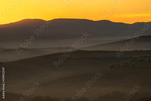 Scenic view of the sunrise in Toscana, Italy. Golden sunrise light in Toscana.