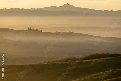 Scenic view of the sunrise in Toscana, Italy. Golden sunrise light in Toscana.