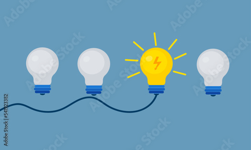 Set of light bulbs with one glowing. Trendy flat vector light bulb icons with concept of idea on blue background.