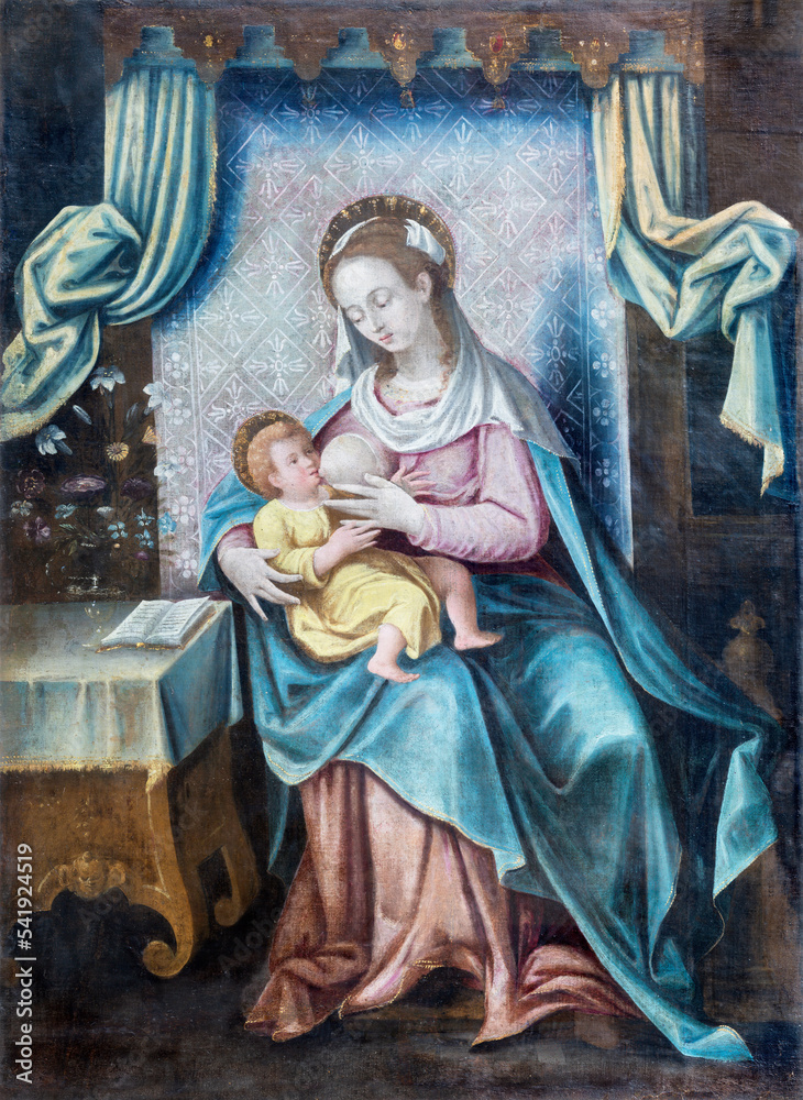 IVREA, ITALY - JULY 15, 2022: The painting of Beastfeeding Madonna in the church Chiesa di San Salvatore by unknown artist.