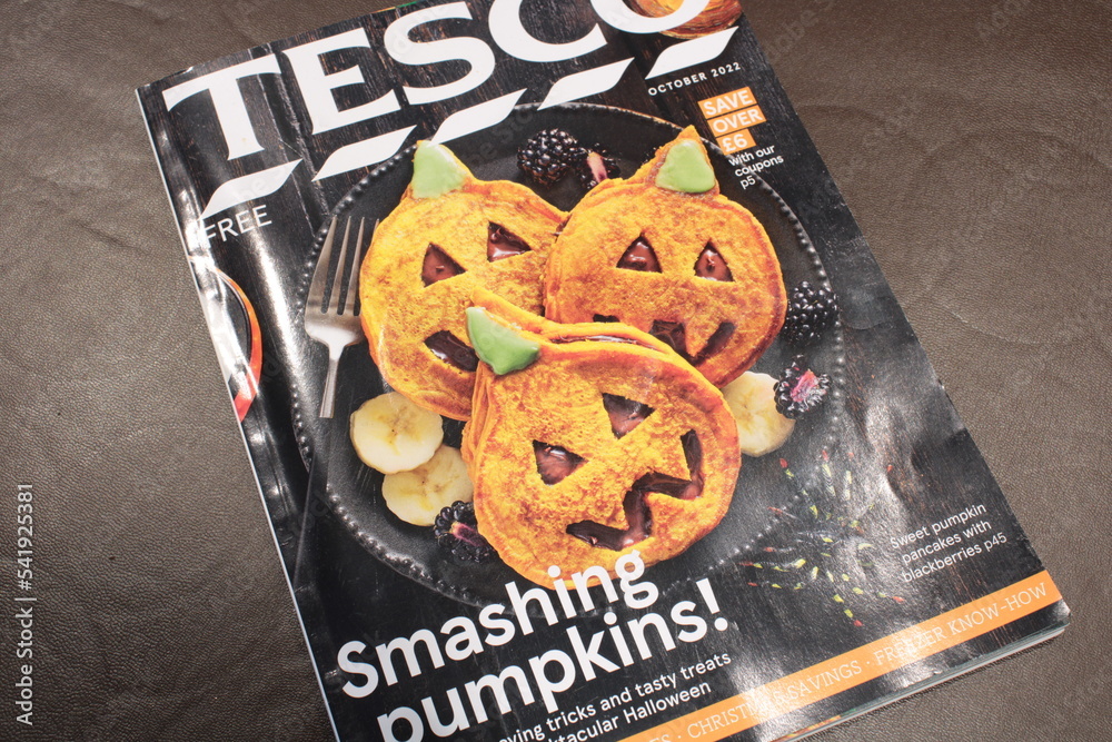 Tesco Halloween catalogue October 2022 on a brown background. Tesco instore Halloween food guide