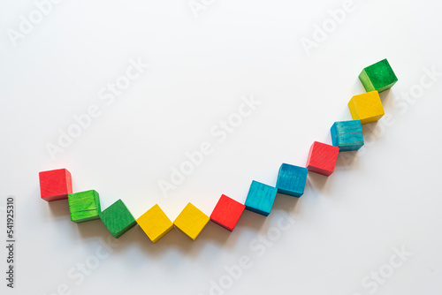 Colorful wooden blocks on a white background. nursery education idea concept.