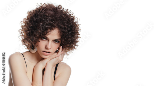 Fashionable portrait of an attractive girl with African curls. Sexy girl in lingerie on a white isolated background.