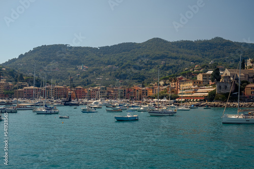 Bay of Santa Margherita Ligure, Liguria, Italy, with recreational boats and majestic buildings.