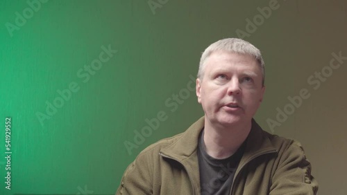 Speaker talking at webcam making conference video call or man talking to someone off camera