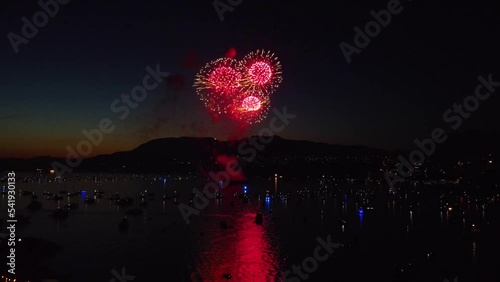 Beautiful view of the fireworks in the night sky in Vancouver, BC photo