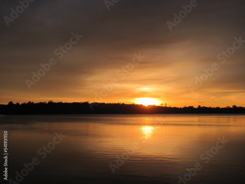 Beautiful sunrise over the lake © Ivan Koliadzhyn