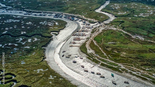 Beautiful aerial view of river Glaven and boats sailing in it at Morston near Blakeney point photo