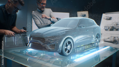 Принти на полотні Two male engineers using digital tablet App, developing 3D model of a sustainable eco friendly electric vehicle