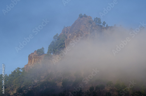 Morro de la Negra cliff in the fog. Integral Natural Reserve of Inagua. Tejeda. Gran Canaria. Canary Islands. Spain.