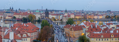 Prague - The panorama of the city with the Charles bridge and the Old Town at dusk.