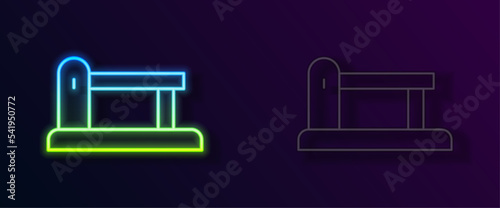 Glowing neon line Railway barrier icon isolated on black background. Vector
