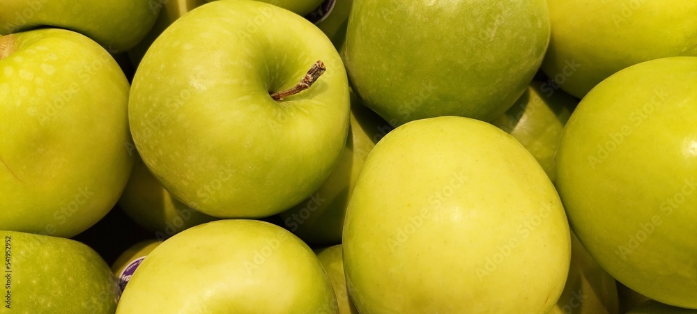 green apples in a market green apples in a market