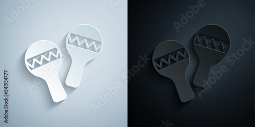 Paper cut Maracas icon isolated on grey and black background. Music maracas instrument mexico. Paper art style. Vector