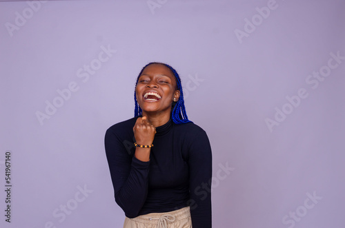 excited african lady isolated over white background