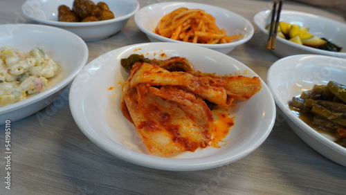 fresh cold kimchi or kimci just brought out from refrigerator served on table of the restaurant