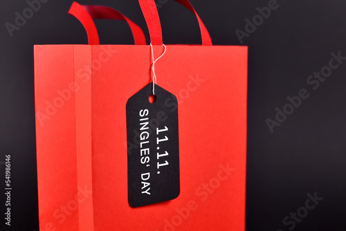 Shopping bag with tag saying '11.11. Singles' Day', a Chinese unofficial holiday and shopping season that celebrates people who are not in relationships photo