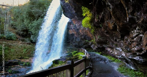 Dry Falls Waterfall, Nantahala National Forest, North Carolina. tourist attraction, a trail behind the natural waterfall in Appalachian mountains