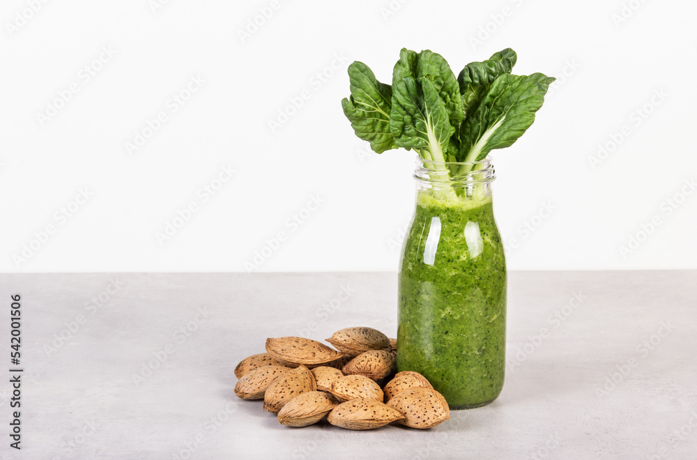 Smoothies with almond milk and chlorophyll. Healthy food concept